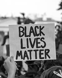 Close up of sign that reads Black Lives Matter
