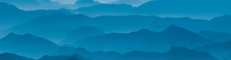 Abstract image of layers of blue mountains