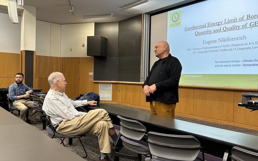 Visiting scholar Eugene Nikiforovich presents on geothermal energy to a seminar audience. Professors Max Zhang and Jeffrey Tester are seated in the front row. 